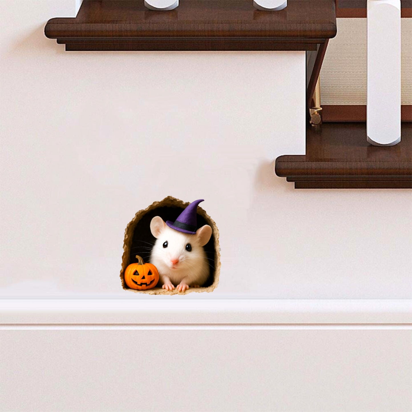 Small animal wearing a Halloween witch hat peeking out from a hole in a staircase with a small pumpkin.