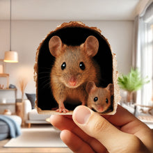 Two small animals peeking out from a cardboard tube held by a hand in a room setting.